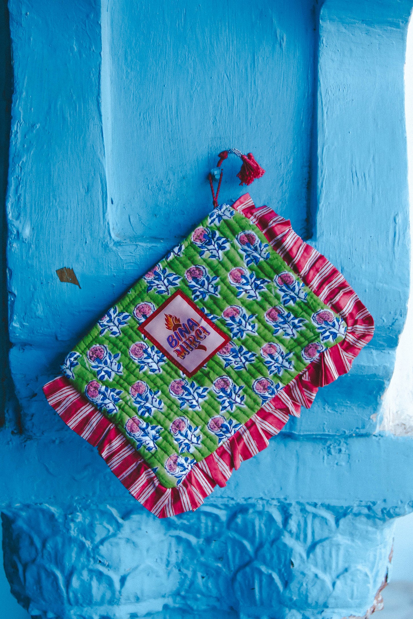 Pochette Kila verde e fuxia