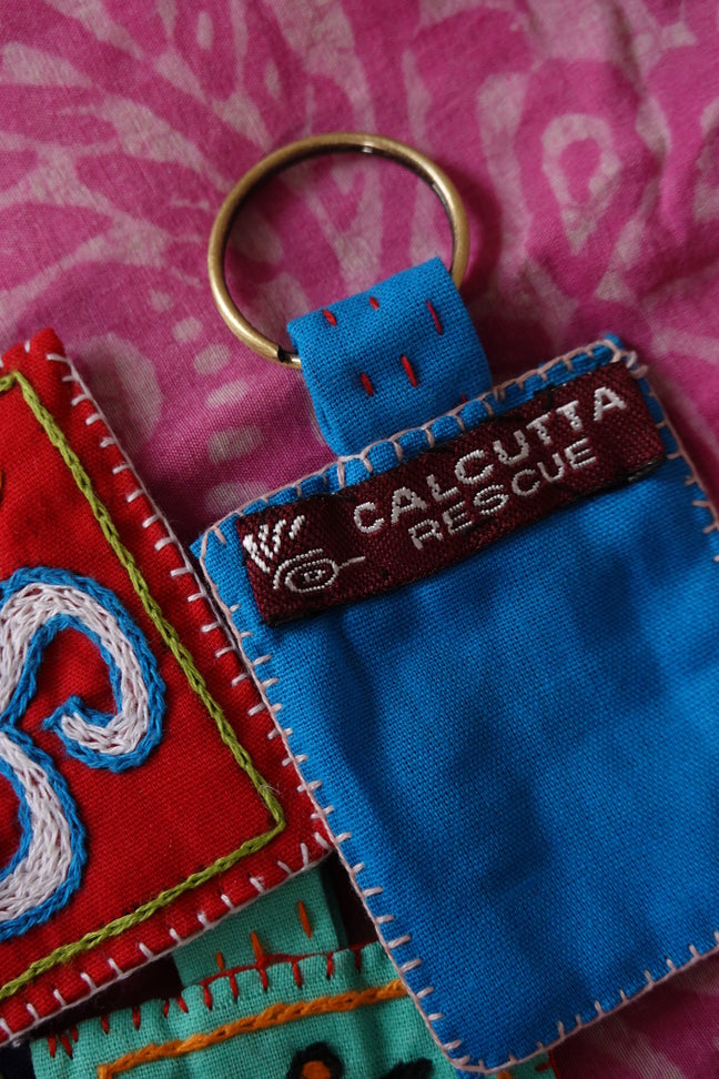Portachiavi ricamati a mano - Calcutta Rescue